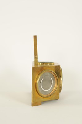 Lot 949 - A LATE 19TH CENTURY BRASS CASED DESK CLOCK COMPENDIUM