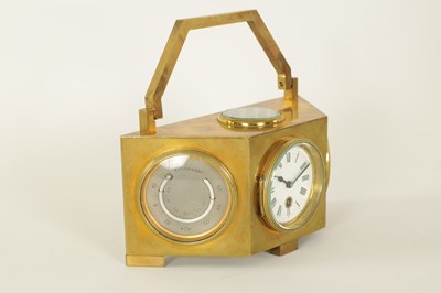 Lot 949 - A LATE 19TH CENTURY BRASS CASED DESK CLOCK COMPENDIUM