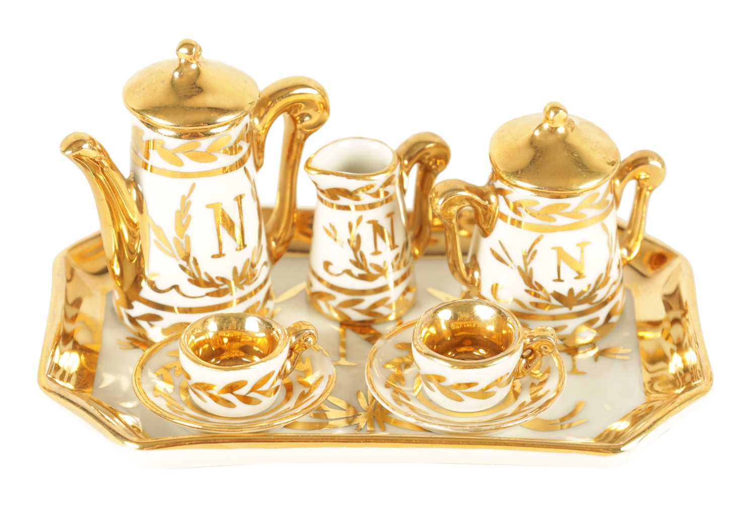Lot 47 - AN EARLY 20TH CENTURY MINIATURE LIMOGES PORCELAIN FRENCH NAPOLEON TEA SERVICE