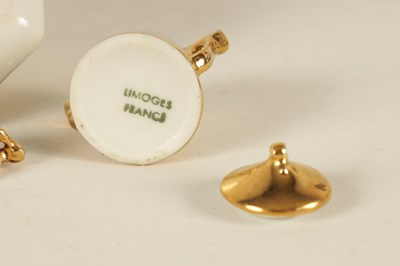 Lot 47 - AN EARLY 20TH CENTURY MINIATURE LIMOGES PORCELAIN FRENCH NAPOLEON TEA SERVICE