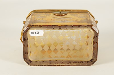 Lot 14 - A 19TH CENTURY BOHEMIAN AMBER GLASS OVERLAY CASKET