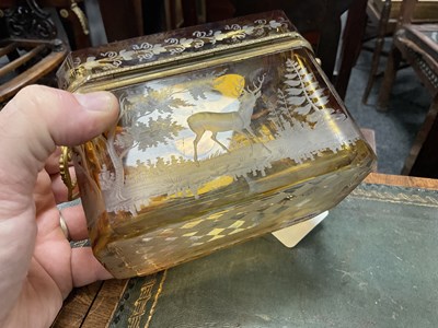 Lot 14 - A 19TH CENTURY BOHEMIAN AMBER GLASS OVERLAY CASKET