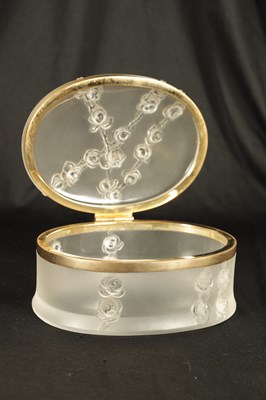 Lot 29 - LALIQUE, FRANCE. A 20TH CENTURY COPPELIA OVAL FROSTED GLASS DRESSING TABLE BOX