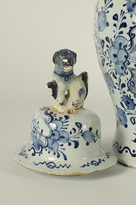 Lot 36 - A PAIR OF 18TH CENTURY BLUE AND WHITE DELFT VASES AND COVER