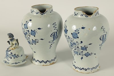 Lot 36 - A PAIR OF 18TH CENTURY BLUE AND WHITE DELFT VASES AND COVER