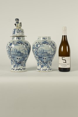 Lot 36 - A PAIR OF 18TH CENTURY BLUE AND WHITE DELFT VASES AND COVER