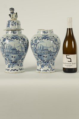Lot 36 - A PAIR OF 18TH CENTURY BLUE AND WHITE DELFT VASES AND COVER