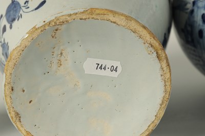 Lot 36 - A PAIR OF 18TH CENTURY BLUE AND WHITE DELFT VASES AND COVER