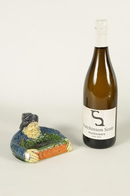 Lot 42 - A 19TH CENTURY FRENCH MAJOLICA POLYCHROME PIN TRAY MODELLED AS A FISHERMAN