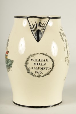 Lot 70 - AN EARLY 19TH CENTURY CREAMWARE PRESENTATION JUG