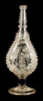 Lot 25 - AN 18TH CENTURY LARGE TAPERING CLEAR GLASS FLASK