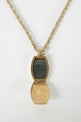 Lot 391 - A 9CT YELLOW GOLD LOCKET NECKLACE