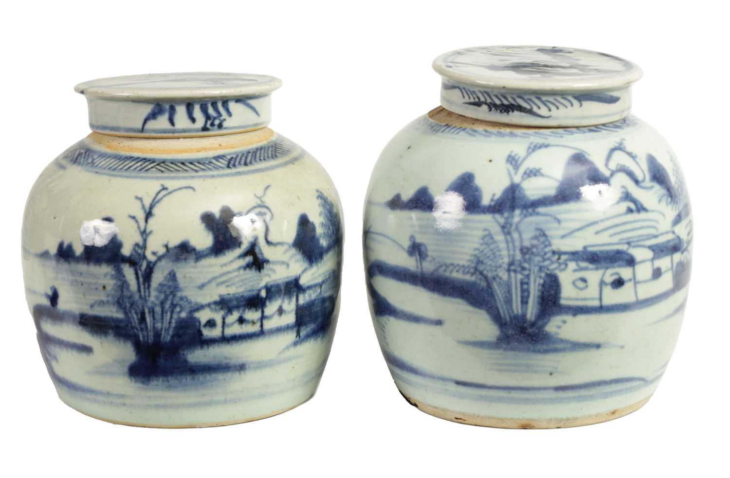 Lot 191 - TWO LATE MING CHINESE BLUE AND WHITE STONEWARE GINGER JARS AND COVERS