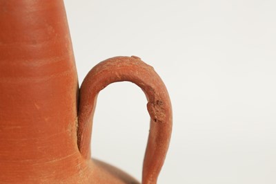 Lot 50 - A ROMAN TWO HANDLED TERRACOTTA VASE