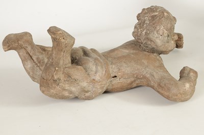 Lot 489 - A 19TH CENTURY CARVED WALNUT AND PAPER MACHE PUTTI