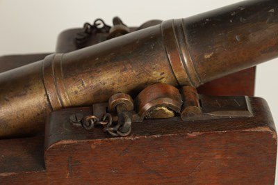 Lot 381 - AN 18TH/19TH CENTURY BRONZE STARTING CANNON
