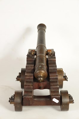 Lot 381 - AN 18TH/19TH CENTURY BRONZE STARTING CANNON