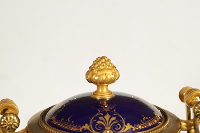 Lot 61 - A FINE PAIR OF 19TH CENTURY ORMOLU AND SEVRES PORCELAIN TWO HANDLED VASE AND COVERS