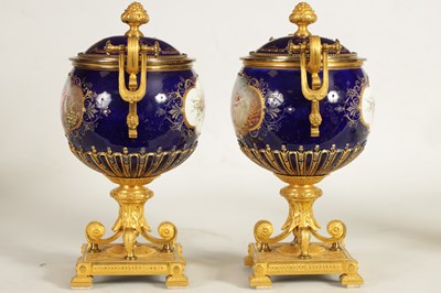 Lot 61 - A FINE PAIR OF 19TH CENTURY ORMOLU AND SEVRES PORCELAIN TWO HANDLED VASE AND COVERS