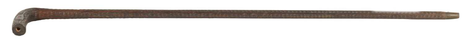 Lot 477 - A 19TH CENTURY CARVED HARDWOOD WALKING STICK