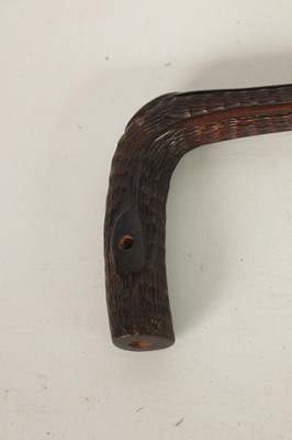 Lot 477 - A 19TH CENTURY CARVED HARDWOOD WALKING STICK
