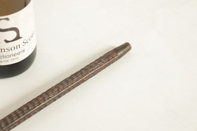 Lot 477 - A 19TH CENTURY CARVED HARDWOOD WALKING STICK