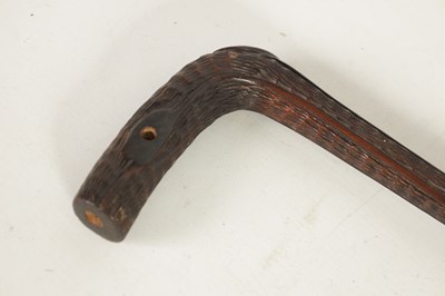 Lot 477 - A 19TH CENTURY CARVED HARDWOOD WALKING STICK