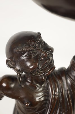 Lot 138 - A LARGE 19TH CENTURY CHINESE BRONZE RAKAN FIGURAL TABLE GONG