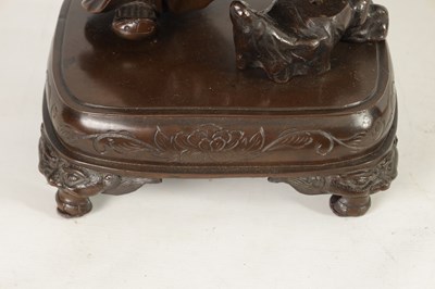 Lot 138 - A LARGE 19TH CENTURY CHINESE BRONZE RAKAN FIGURAL TABLE GONG