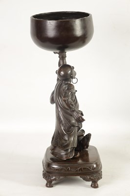 Lot 138 - A LARGE 19TH CENTURY CHINESE BRONZE RAKAN FIGURAL TABLE GONG