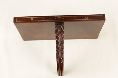 Lot 901 - A REGENCY MAHOGANY BRASS INLAID CLOCK BRACKET