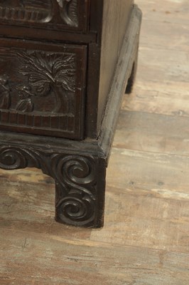 Lot 835 - A GEORGE III CARVED OAK BUREAU