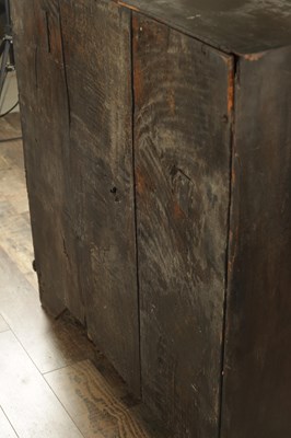 Lot 835 - A GEORGE III CARVED OAK BUREAU
