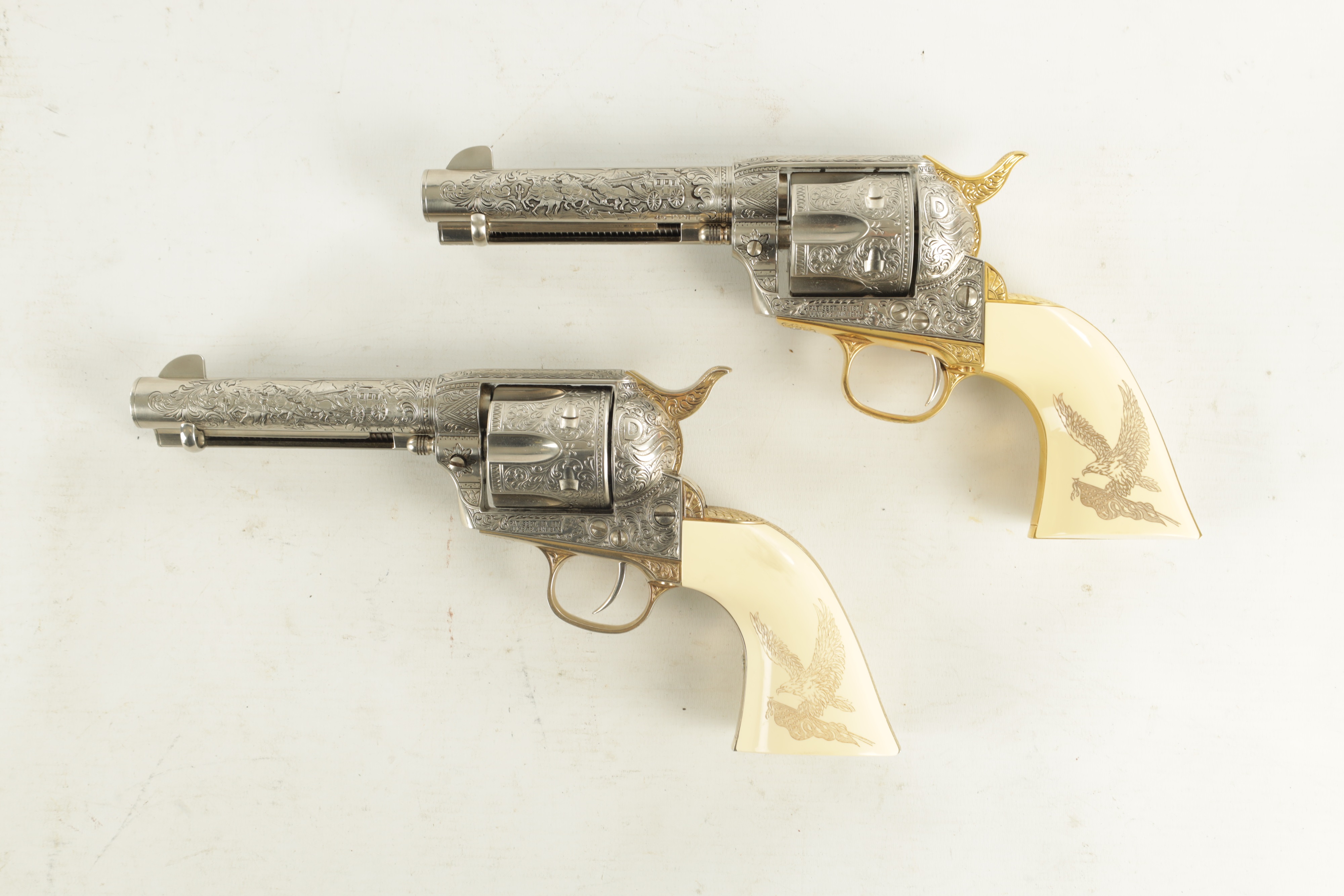 Lot 560 - A PAIR OF FRANKLIN MINT JOHN WAYNE WESTERN