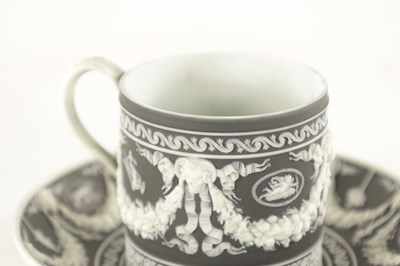Lot 71 - A 19TH CENTURY WEDGWOOD BLACK BASALT JASPERWARE CABINET CUP AND SAUCER