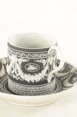 Lot 71 - A 19TH CENTURY WEDGWOOD BLACK BASALT JASPERWARE CABINET CUP AND SAUCER