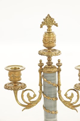 Lot 1058 - A 19TH CENTURY FRENCH MARBLE AND ORMOLU MOUNTED CLOCK GARNITURE