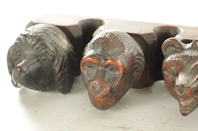 Lot 1172 - A 19TH CENTURY CARVED BLACK FOREST PIPE RACK