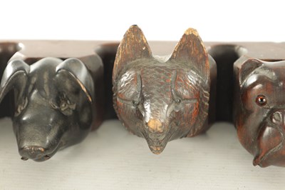 Lot 1172 - A 19TH CENTURY CARVED BLACK FOREST PIPE RACK