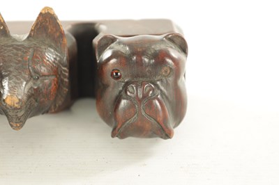 Lot 1172 - A 19TH CENTURY CARVED BLACK FOREST PIPE RACK
