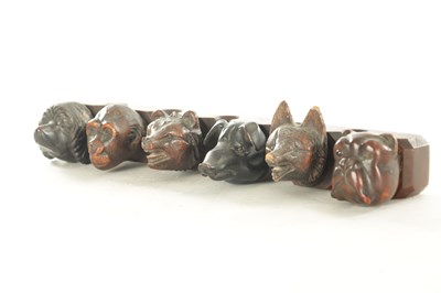 Lot 1172 - A 19TH CENTURY CARVED BLACK FOREST PIPE RACK