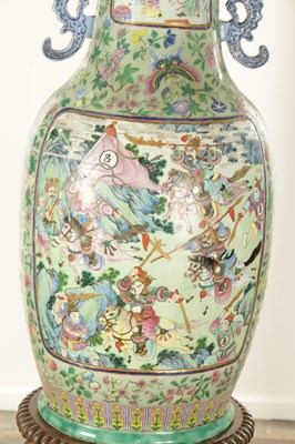 Lot 120 - AN IMPRESSIVE PAIR OF 19TH CENTURY CANTONESE CELADON GROUND AND FAMILLE ROSE HALL VASES ON LATE REGENCY ROSEWOOD STANDS