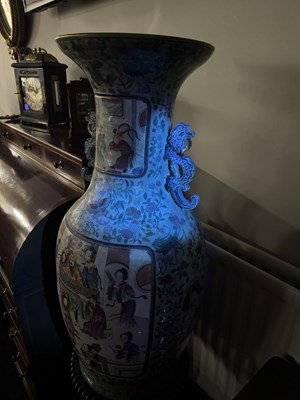 Lot 120 - AN IMPRESSIVE PAIR OF 19TH CENTURY CANTONESE CELADON GROUND AND FAMILLE ROSE HALL VASES ON LATE REGENCY ROSEWOOD STANDS