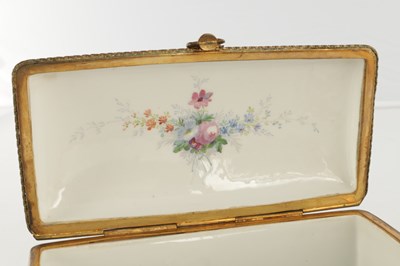 Lot 59 - A FINE 19TH CENTURY ORMOLU MOUNTED SEVRES PORCELAIN RECTANGULAR TABLE CASKET