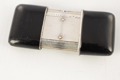 Lot 1427 - AN EARLY 20TH CENTURY SWISS MOVADO ERMETO SILVER ENAMEL TRAVEL WATCH