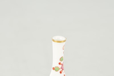 Lot 48 - A 19TH CENTURY MEISSEN PORCELAIN POUNCE POT AND A MINIATURE MEISSEN VASE