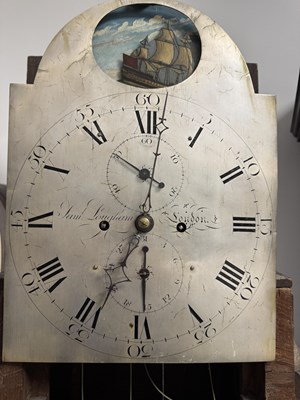Lot 1335 - SAMUEL LONGHAM, LONDON. A GEORGE III FIGURED MAHOGANY SILVERED DIAL ROCKING SHIP AUTOMANTAN EIGHT-DAY LONGCASE CLOCK