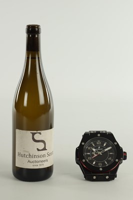 Lot 976 - A BLACK STEEL HUBLOT BIG BANG FERRARI DESK CLOCK