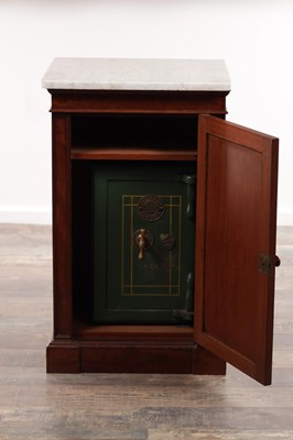 Lot 1230 - A 19TH CENTURY MAHOGANY PEDESTAL SAFE CABINET WITH A WHITE MARBLE TOP