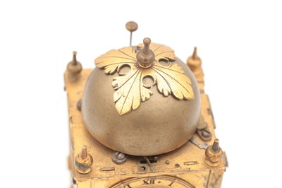 Lot 1301 - AN EARLY 17TH CENTURY GERMAN GILT CASED STRIKING TABLE CLOCK